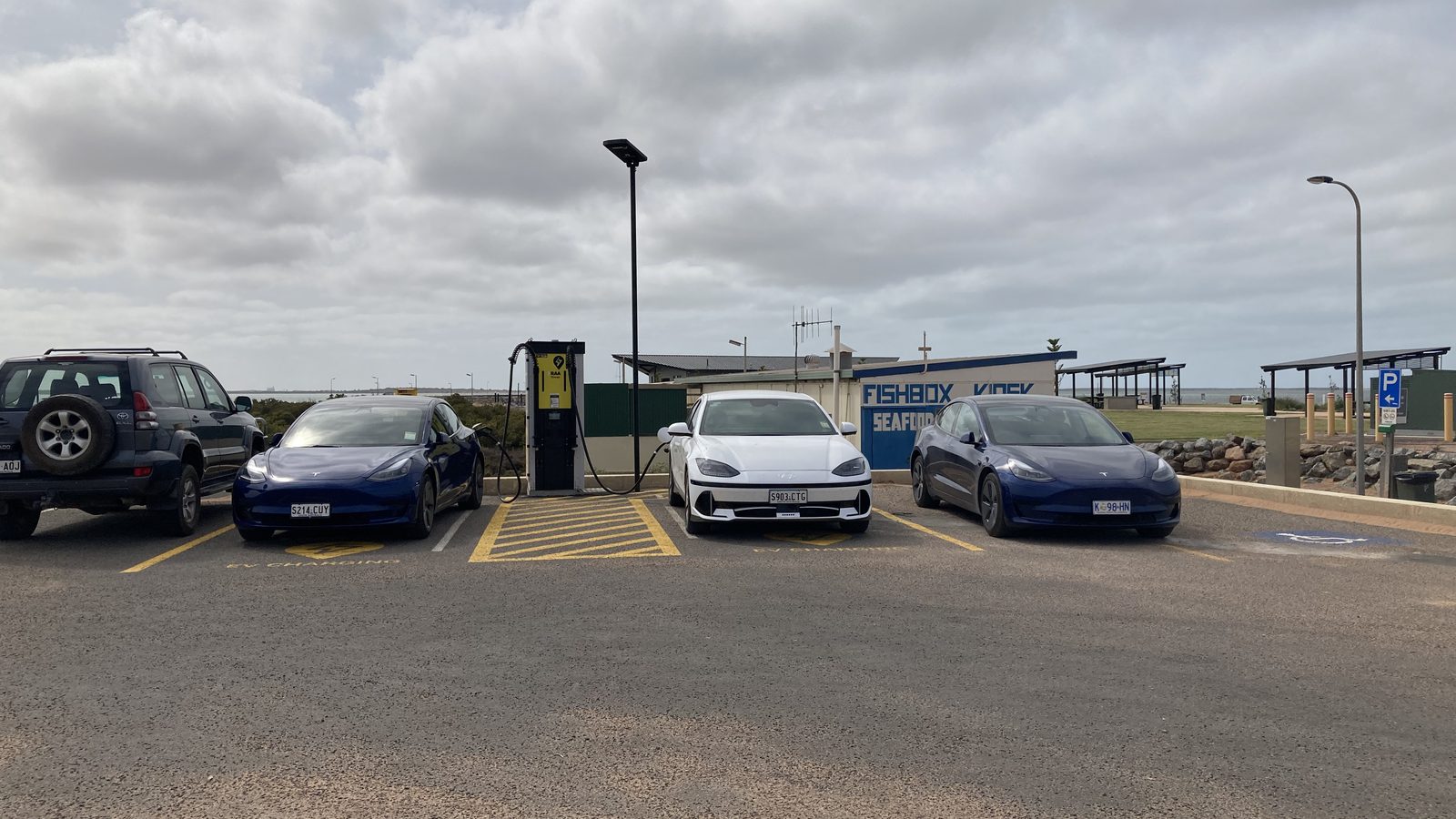 Electric cars parked at an RAA charging station in Cowell, South Australia